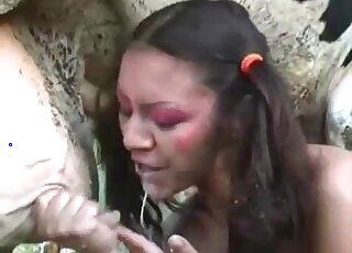 Brunette loves sucking animal cocks outdoors